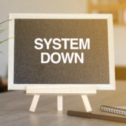 system downtime impact sign