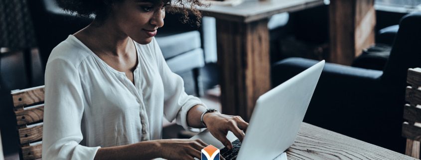 women at computer desk